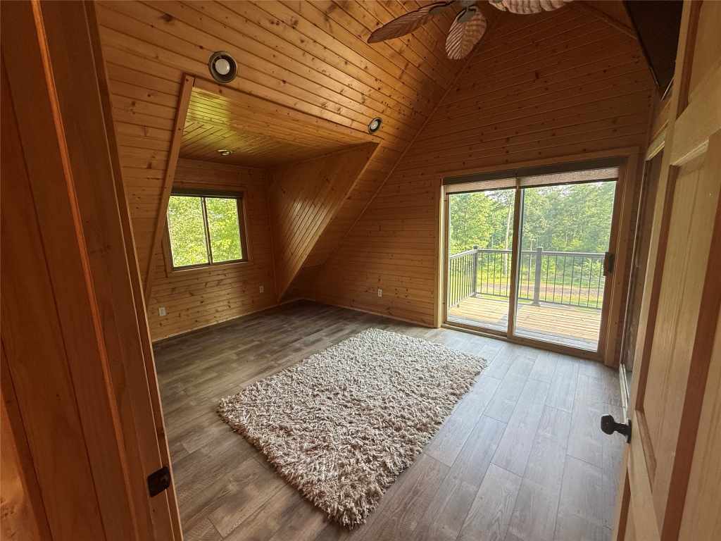 Upper loft with doors to the deck
